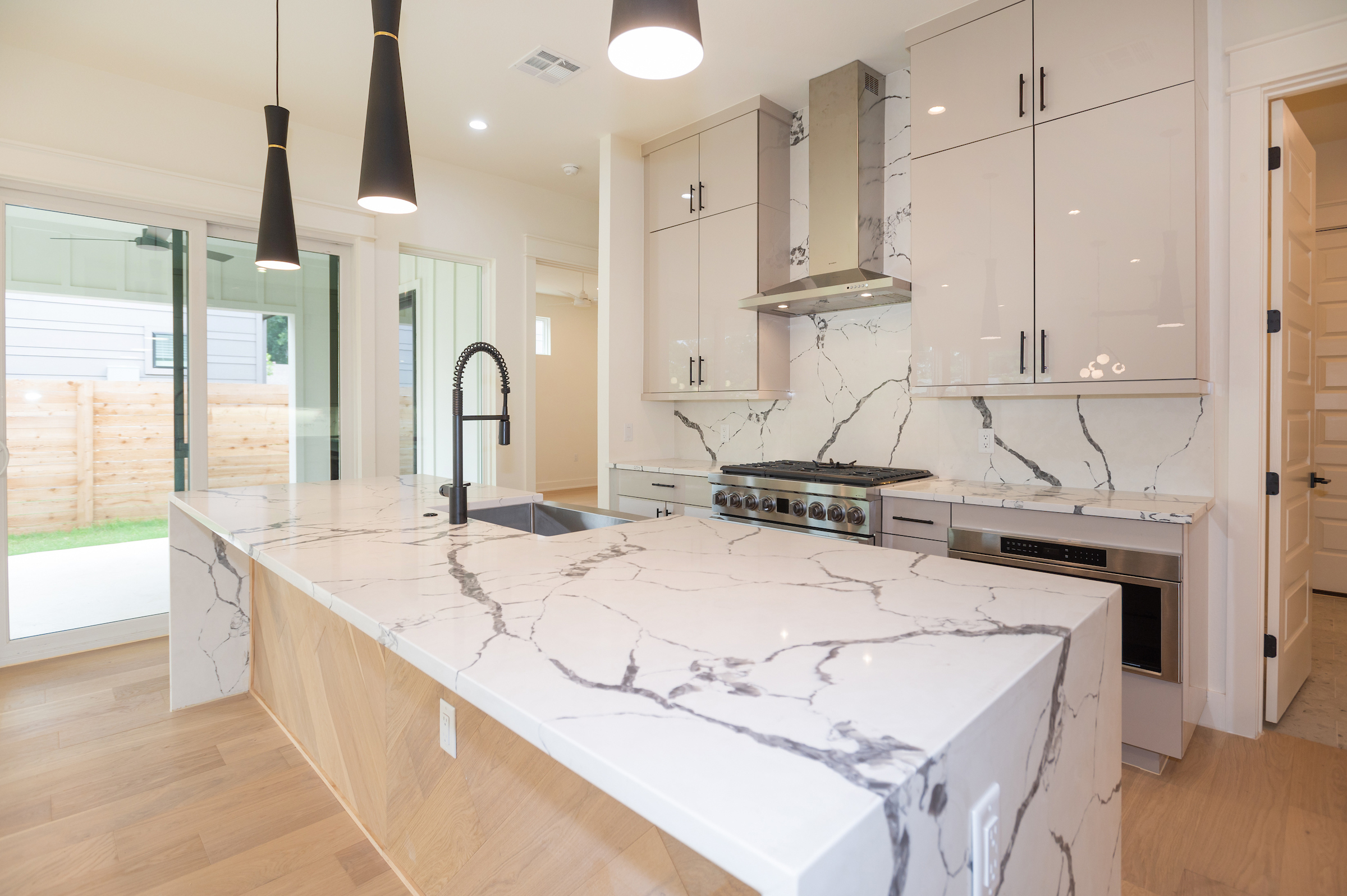 interior%20of%20a%20modern%20kitchen%20with%20white%20marble%20counters interior%20of%20a%20modern%20kitchen%20with%20white%20marble%20counters